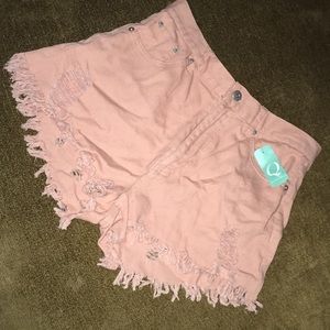 Pink jean shorts.